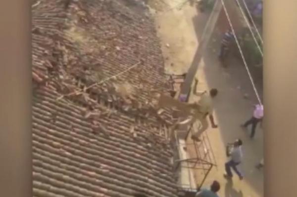 Indian-forest-ranger-jumps-off-house-roof-to-dodge-leopard-attack.jpg