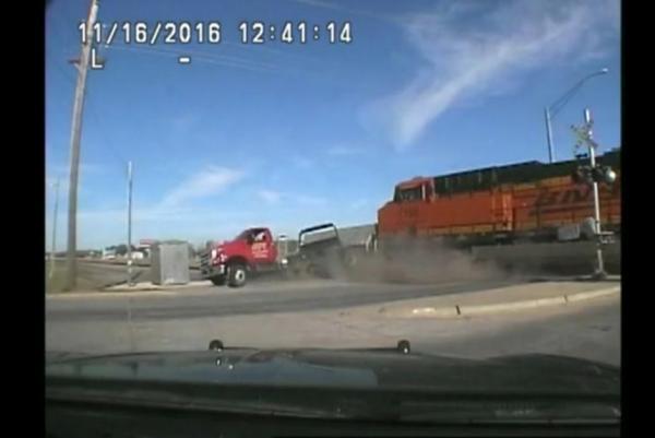 tow truck hit by train.jpg